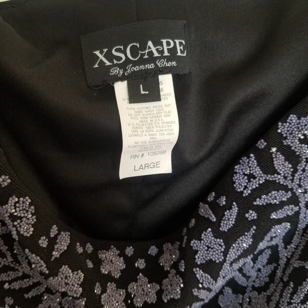 Xscaped off the shoulder top